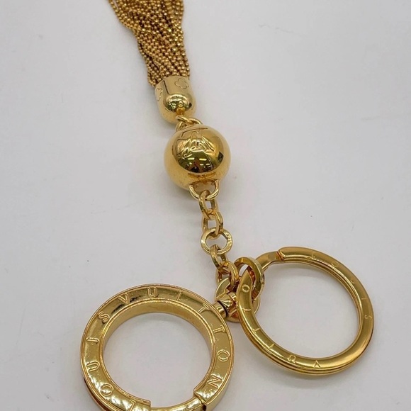 Auth Louis Vuitton Portecle Gold Color
Key Ring/Holder W/Box - Picture 9 of 10